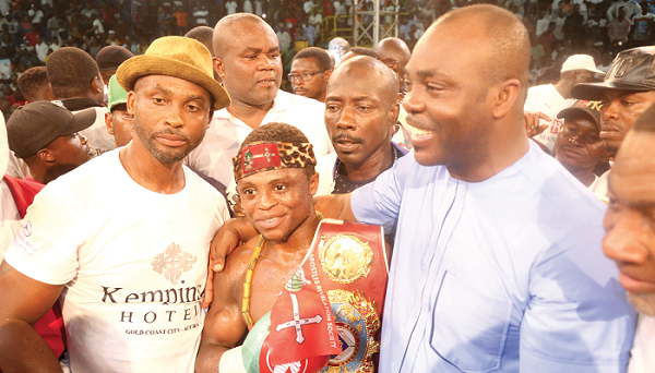  Youth and Sports Minister, Isaac Asiamah (right), congratulating Isaac Dogboe after his TKO victory. Picture: SAMUEL TEI ADANO
